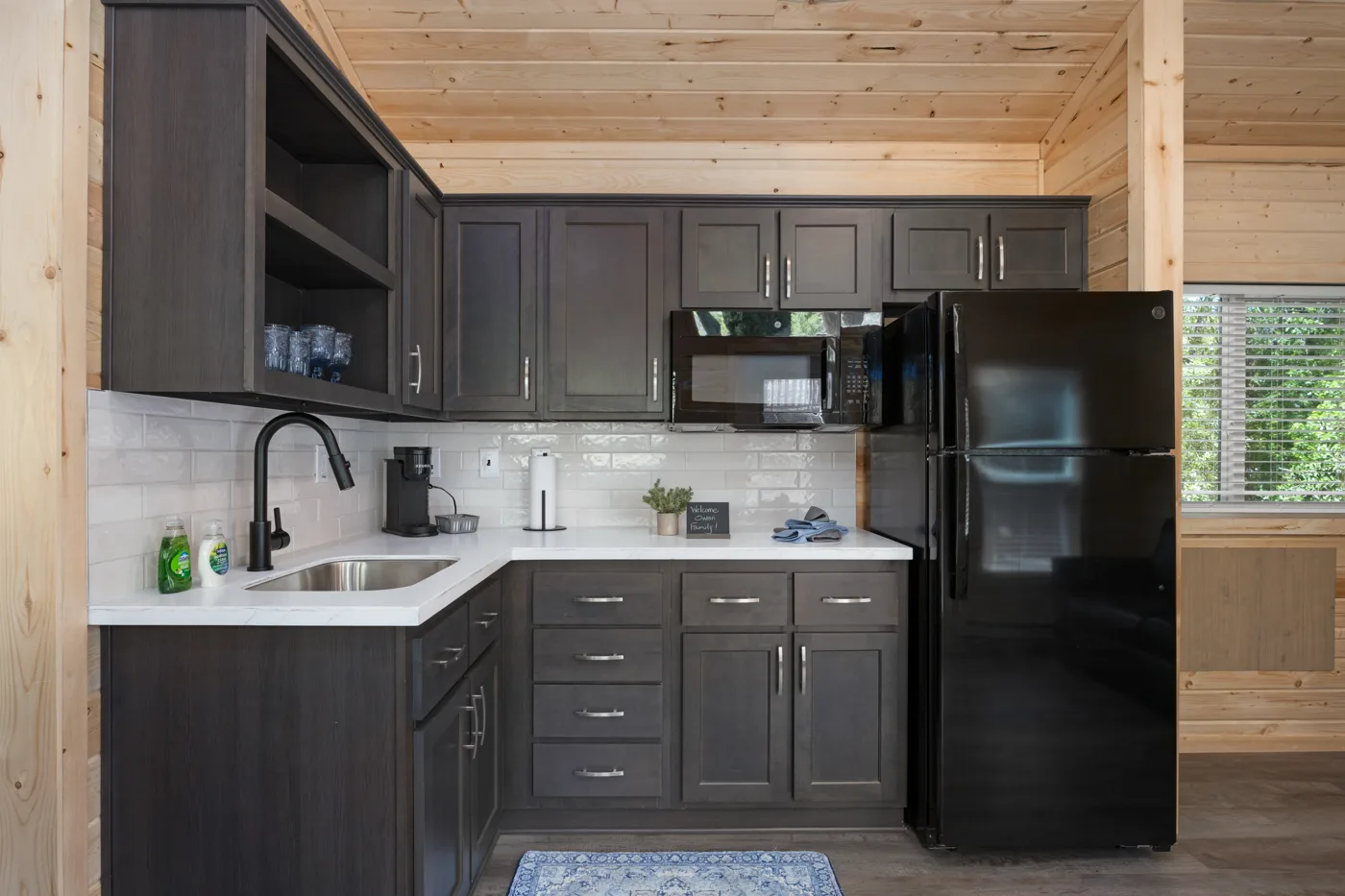microwave oven, a refrigerator, crock pot, electric skillet, toaster, and coffee pot