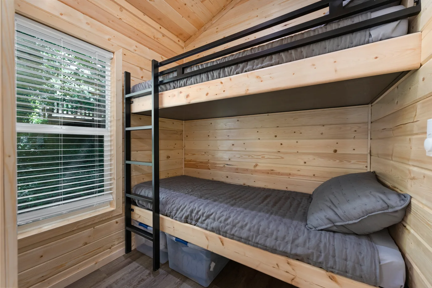 set of bunk beds and some storage for clothes