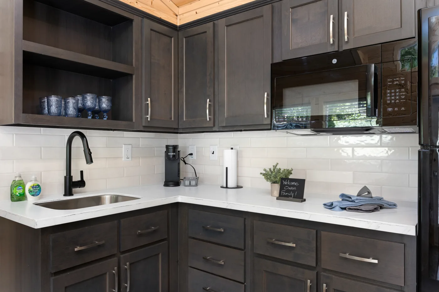 microwave oven, a refrigerator, crock pot, electric skillet, toaster, and coffee pot